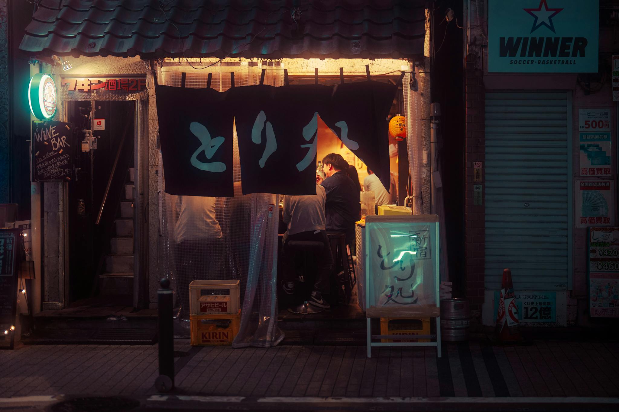 A warm and inviting izakaya scene in Tokyo's vibrant nightlife, showcasing Japanese culture.